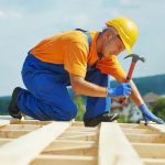 Experienced roofing experts replacing damaged roofs in Edison